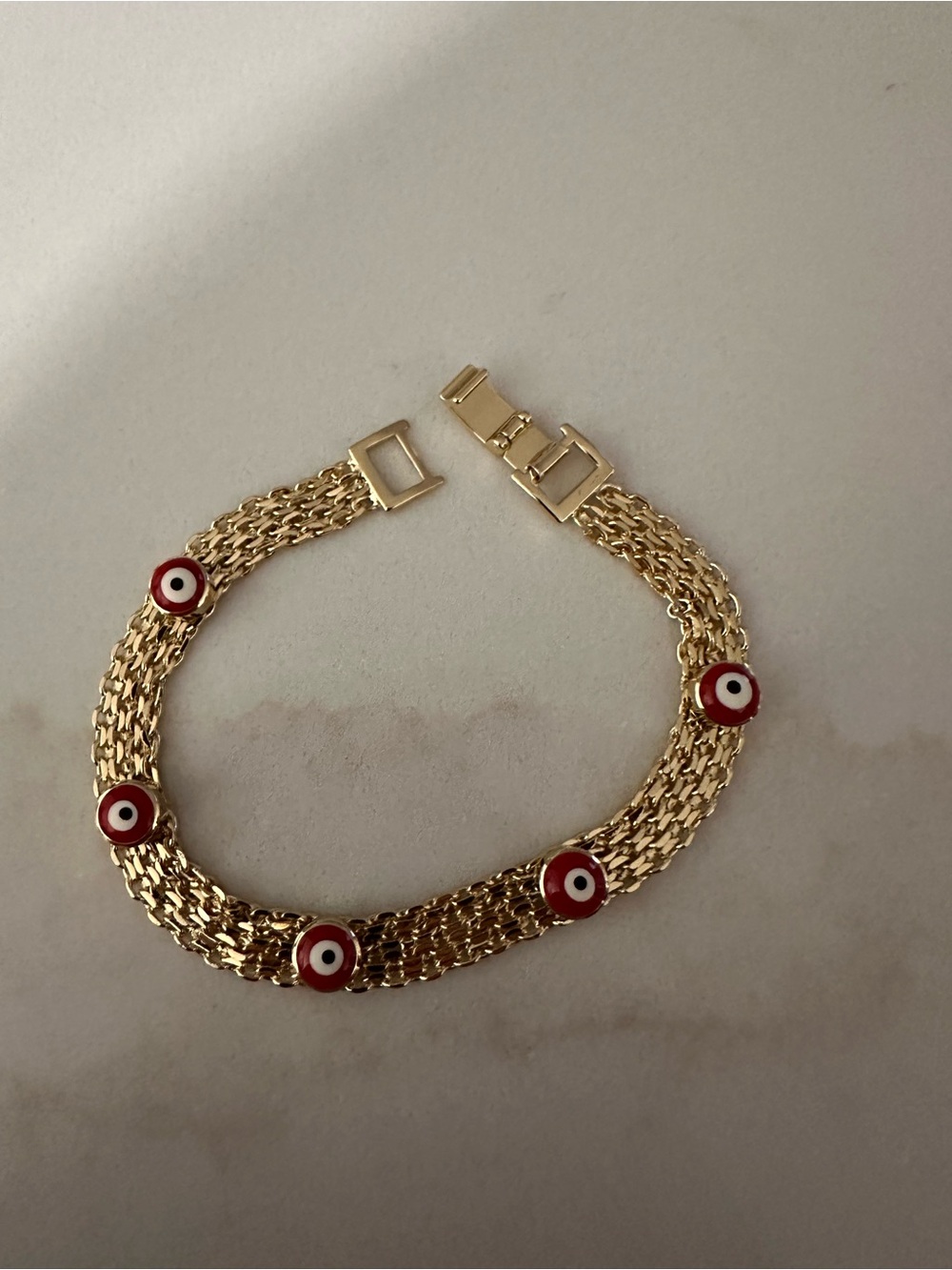 Gold Chain Bracelet with Red Evil Eye Accents